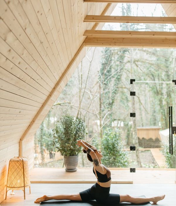 Person practicing gentle yoga movements for daily flexibility